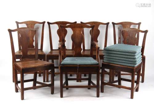 Property of a lady - a set of seven 18th century George III oak country dining chairs including