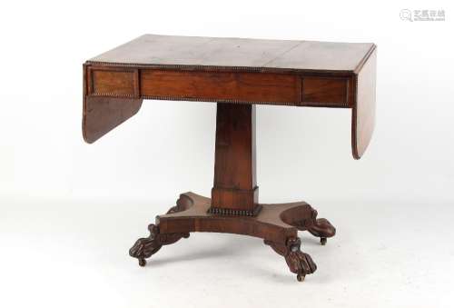 Property of a gentleman - an early 19th century Regency period rosewood pedestal pembroke table with