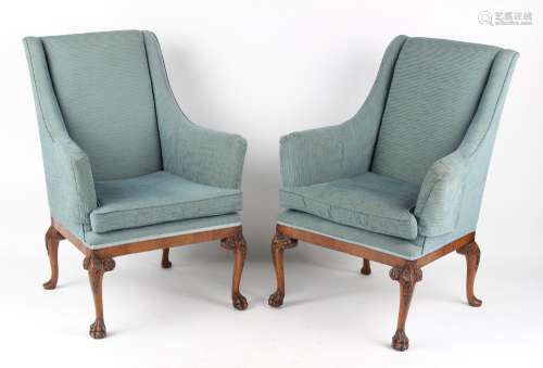 Property of a lady - a pair of George II style carved walnut & upholstered armchairs, the cabriole