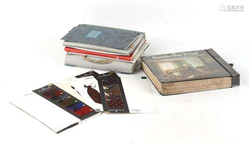 A box containing textile sample books including a Sanderson Triad wallpaper sample book (a lot).