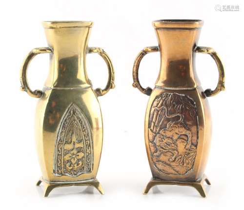 Two similar late 19th / early 20th century Japanese bronze vases, one with panels depicting a