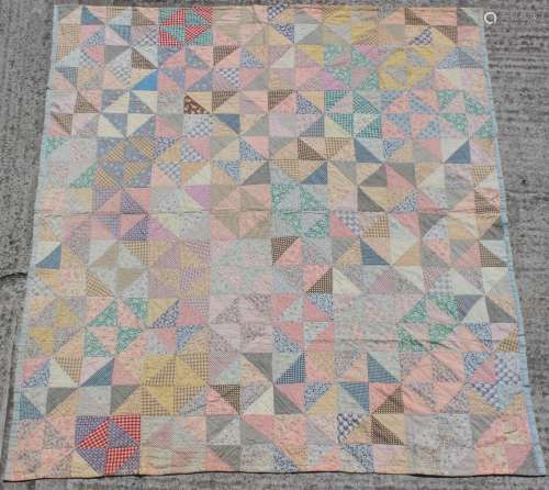 Property of a lady - a late 19th / early 20th century cotton patchwork quilt, with blue check