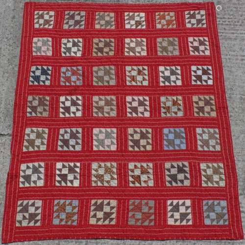 Property of a lady - a late 19th / early 20th century cotton patchwork quilt, with patterned squares