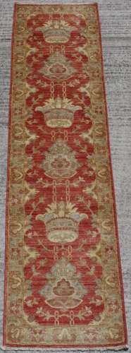 Property of a deceased estate - a Ziegler style runner, 120 by 32ins. (304 by 80cms.).