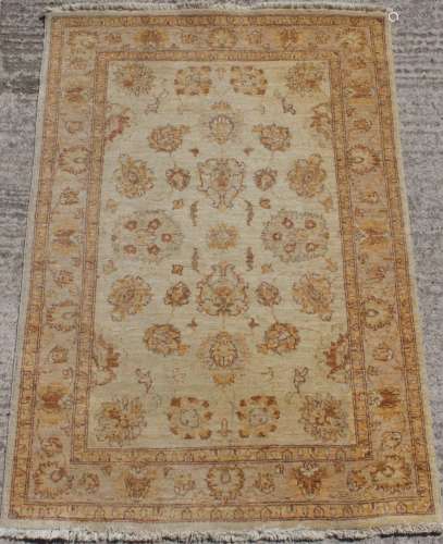 Property of a deceased estate - a Ziegler style rug, 72 by 48ins. (183 by 123cms.).