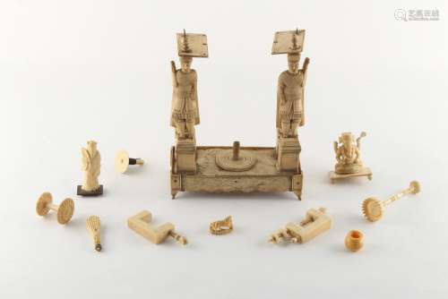 Property of a lady - a 19th century Indian carved bone stand, possibly for a watch, modelled as a