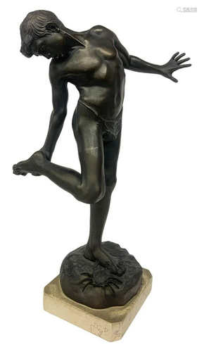 Statuette depicting antimony boy with crab. …