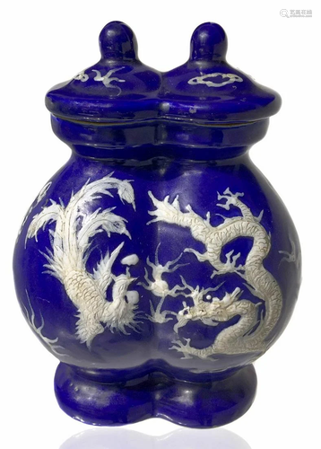 Double blue vase with relief decoration on …