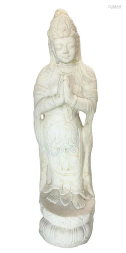 Statue of Guanyin praying in white marble, …