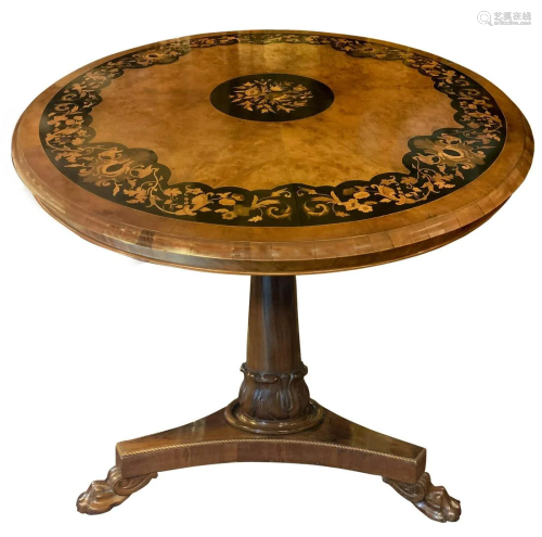 Round table inlaid on the floor with light w…