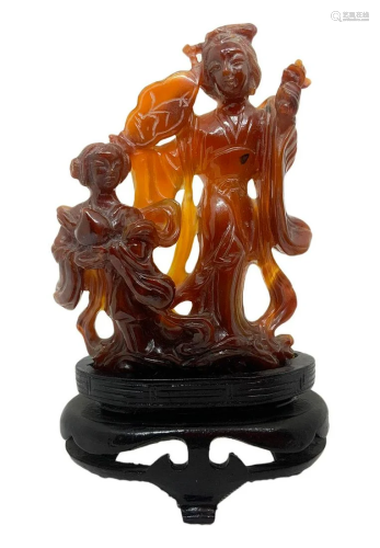 Chinese statuette in brown carnelian depicting