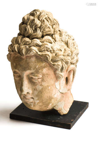 A GANDHARA STUCCO HEAD OF BUDDHA, NORTH-WEST FRONTIER REGION, INDIA (NOW PAKISTAN), 4TH / 5TH CENTUR