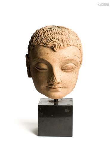 A GANDHARA TERRACOTTA HEAD OF BUDDHA, NORTH-WEST FRONTIER REGION, INDIA (NOW PAKISTAN), 4TH / 5TH CE