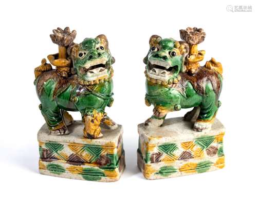 A PAIR OF CHINESE SANCAI GLAZED BUDDHIST LION JOSS STICK HOLDERS, KANGXI PERIOD (1662-1722)