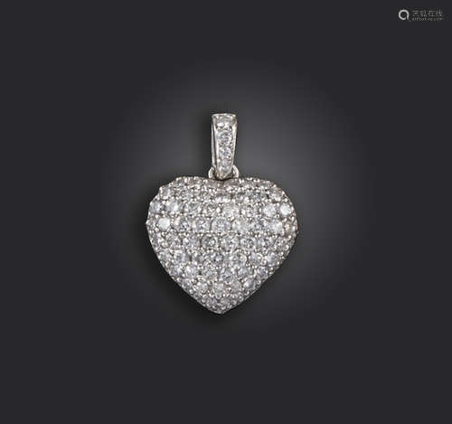 A diamond heart pendant. pave-set overall with graduated circular-cut diamonds and a diamond-set