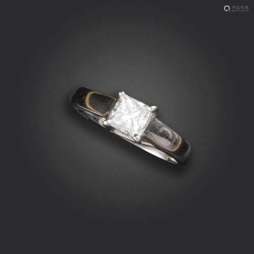 A princess-cut diamond solitaire ring, weighing approximately 0.75cts, in 18ct white gold, London
