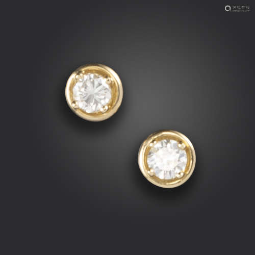 A pair of diamond stud earrings, the round brilliant-cut diamonds weigh approximately 0.70cts total,