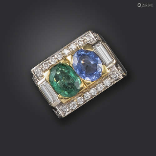 A sapphire, emerald and diamond dress ring, the cuboid mount set with an oval emerald and sapphire