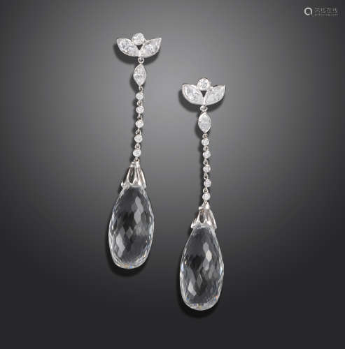 A pair of diamond-set briolette drop earrings, the white stone briolettes suspend from an