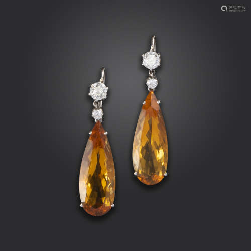 A pair of citrine and diamond drop earrings, each pear-shaped citrine suspends from two old