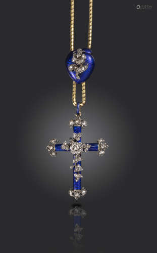 A Victorian diamond and enamel cruciform pendant, the cross with diamond foliate decoration and blue