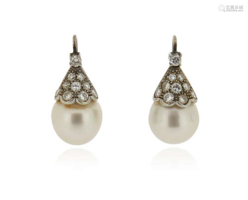 A pair of cultured pearl and diamond drop earrings, the cultured pearls measure 11.6mm approximately