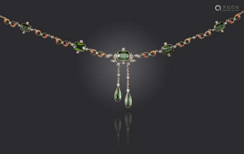 An Edwardian tourmaline and diamond-set necklace, the centre section mounted with a cushion-shaped