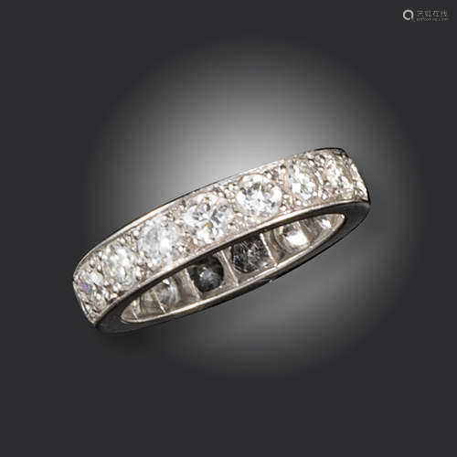 A diamond full-circle eternity ring, set with circular-cut diamonds weighing approximately 2.50cts