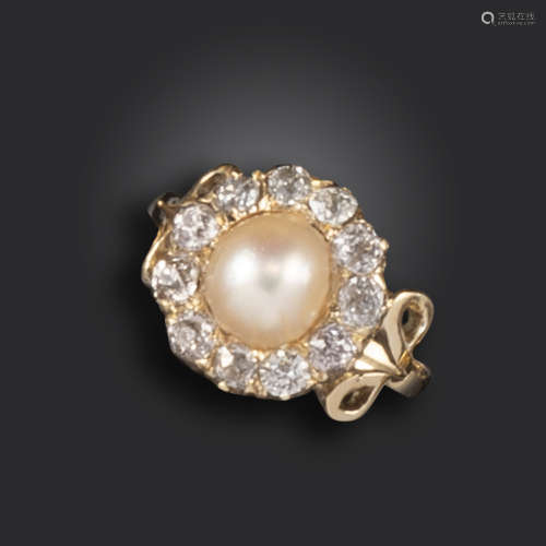 An untested pearl and diamond ring, centred with a half pearl within a surround of old cushion-