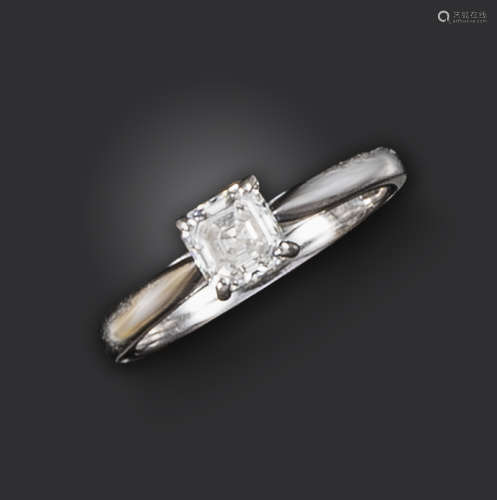 A diamond solitaire ring, the Asscher-cut diamond weighs 0.57cts and is claw-set in platinum, London
