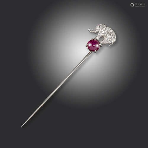 An Art Deco ruby and diamond elephant stickpin by Raymond Yard, the circus elephant pave-set with