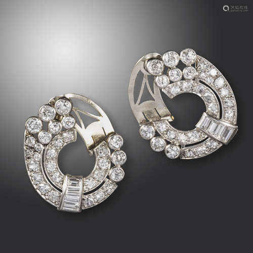 A pair of diamond-set circular ear clips, c1940, the concentric circles set with graduated