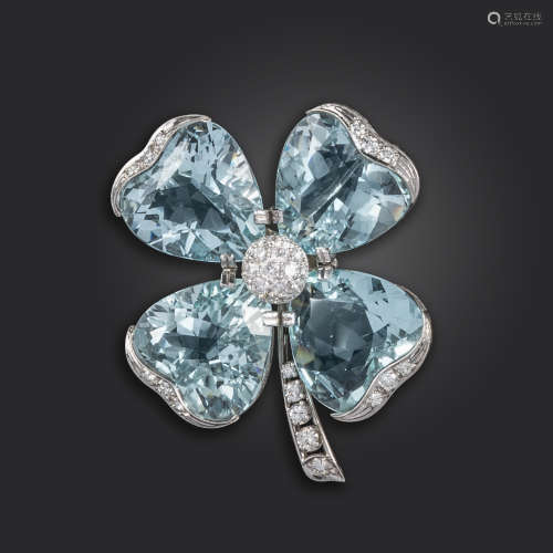 An aquamarine and diamond shamrock brooch, the heart-shaped aquamarines set with diamond accents and