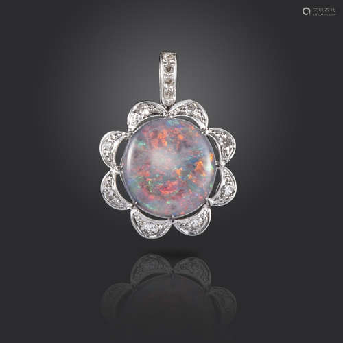 An opal and diamond pendant, the solid black opal cabochon set within scalloped diamond surround