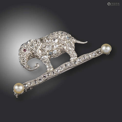 An early 20th century Indian inspired diamond-set elephant brooch by Cartier, the elephant pave-