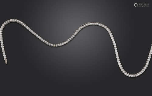 A diamond rivière necklace, the 118 round brilliant-cut diamonds weigh approximately 16cts in total,