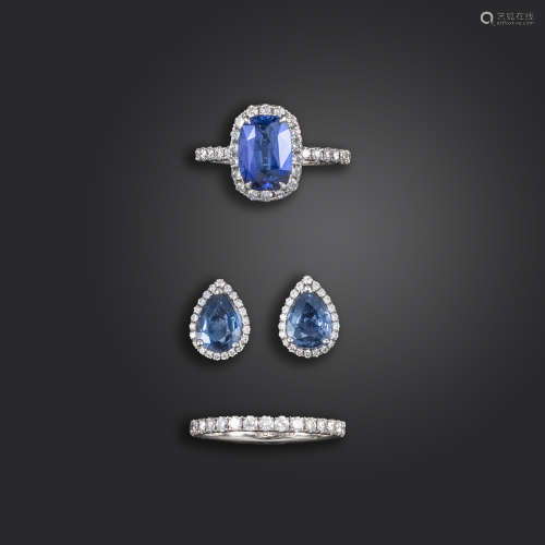 A sapphire and diamond suite of jewellery, including a sapphire and diamond cluster ring, the