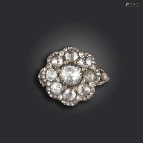A diamond cluster ring, of flowerhead design and set with rose-cut diamonds in silver on gold