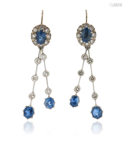 A pair of sapphire and diamond drop earrings, the sapphire and diamond cluster upper sections