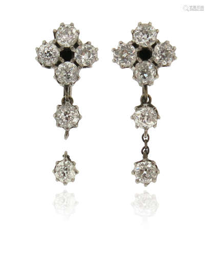 A pair of diamond drop earrings, each set with old cushion-shaped diamonds in white gold (one