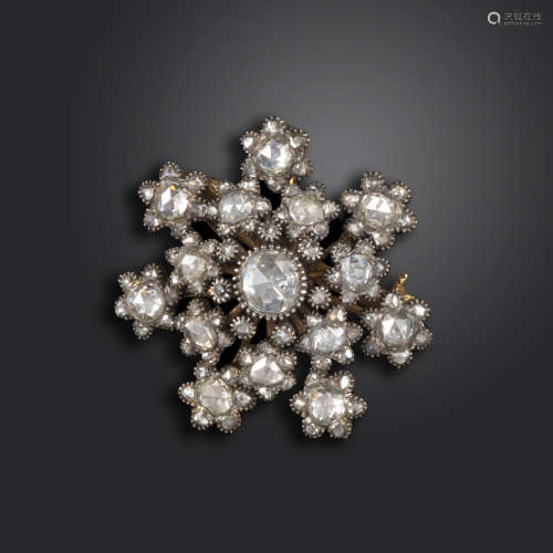 A 19th century rose-cut diamond brooch, designed as a snowflake and set overall with graduated