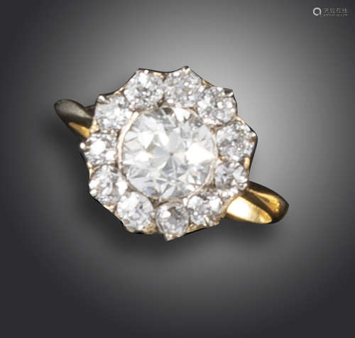 A Victorian diamond cluster ring, set with graduated old circular-cut diamonds in gold, size L