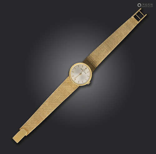 A lady's gold wristwatch by Jaeger LeCoultre, the signed dial with baton numerals, manual