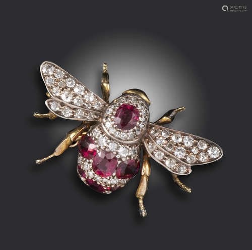 A late Victorian diamond and ruby-set bee brooch, realistically formed and pave-set overall with old