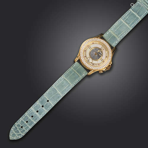 A diamond-set 18ct yellow gold alarm watch by Mauboussin, model R21369, case number 103, the bezel