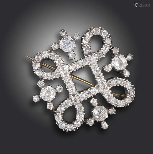 A Victorian diamond-set quatrefoil brooch, set with graduated old cushion-shaped and circular-cut