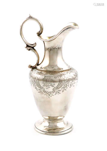 A Victorian silver cream jug, by Stephen Smith, London 1846, baluster form, scroll handle,