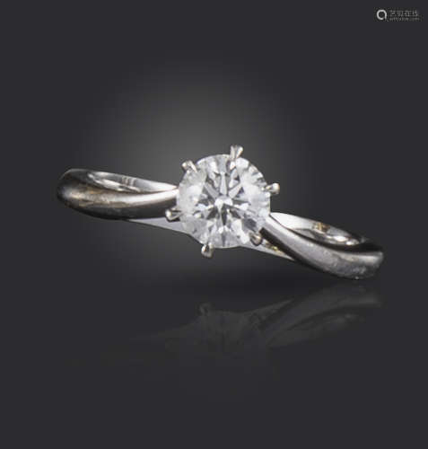 A diamond solitaire ring, the round brilliant-cut diamond weighs approximately 0.55cts, set in