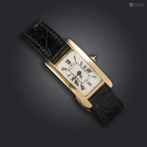 A Tank Americaine gold wristwatch by Cartier, the signed rectangular dial with Roman numerals,