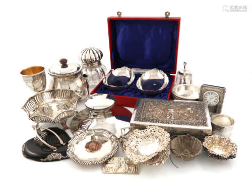 λA mixed lot of silver items, comprising: a Victorian silver-mounted glass inkwell, London 1884, a